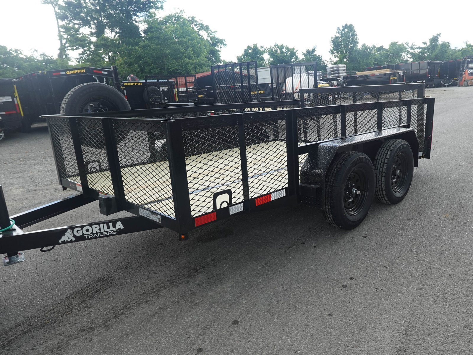DSC04679-1_3e25e111-76b3-4ebb-97df-1e432c4cbe1a-scaled-1.jpg 7′ X 12′ Dovetail Utility Trailer 2ft Mesh - Image 1